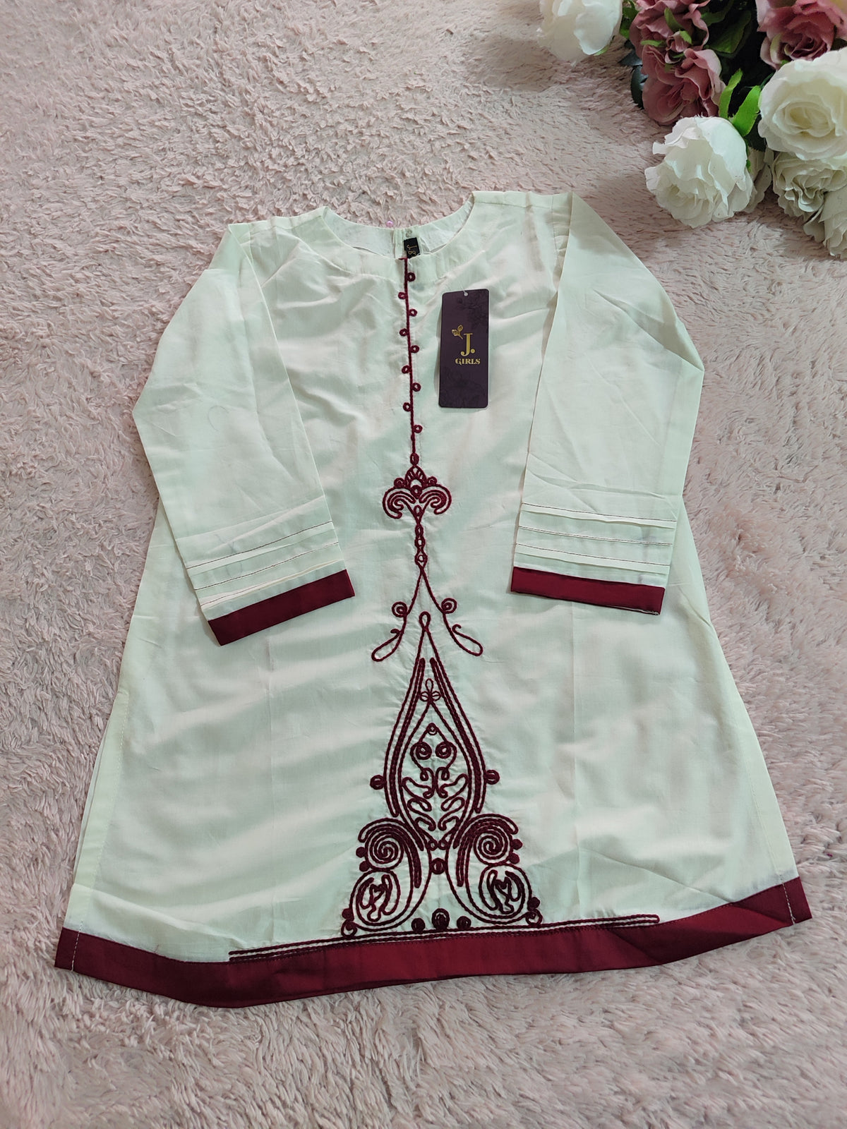 J. Kurti